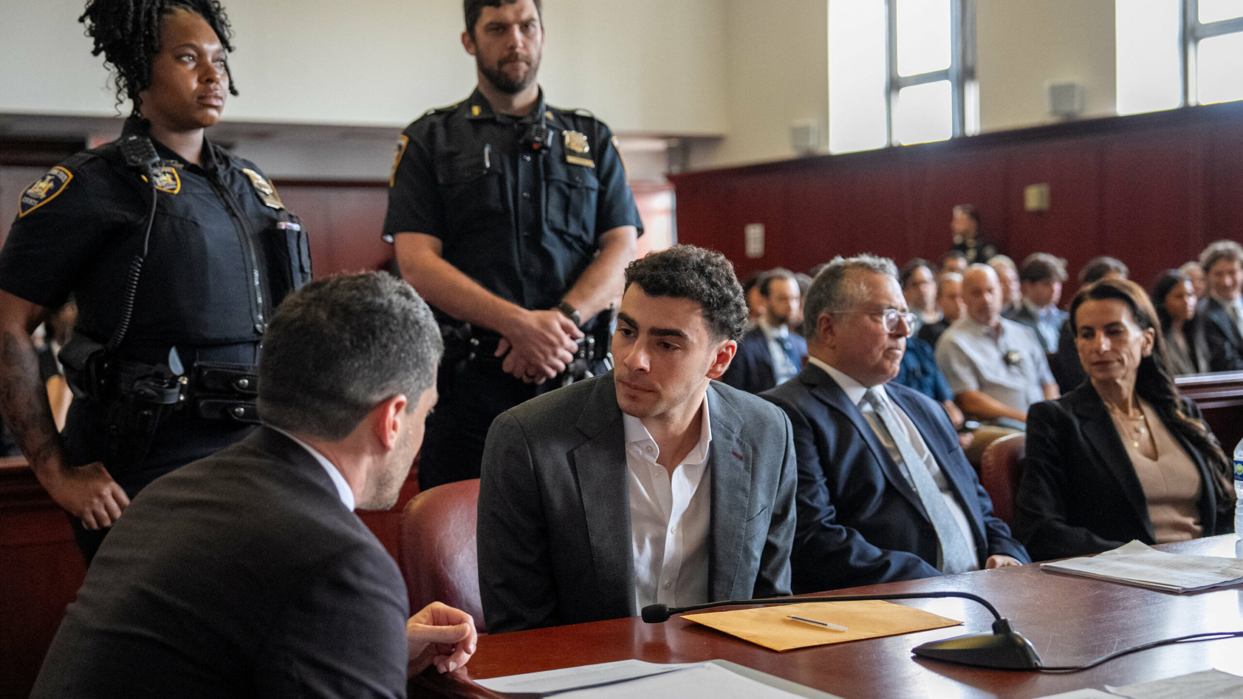 Luigi Mangione escorted into federal courthouse in Manhattan for a pretrial hearing.